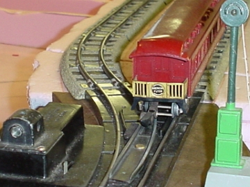 Closeup view of switch and end of train.