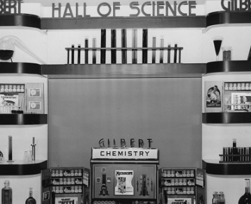 This photo appears to be a slightly differently arranged version of the same display that appeared in the May 1938 issue of Playthings Magazine. That photo was presented by Bruce Manson, in his second Train Collector's Quarterly article cited on the New York Hall of Science page, as evidence that Gilbert used the phrase "Hall of Science" even before opening the building on 25th Ave and Broadway in 1941. This photo most likely dates from the same time period.