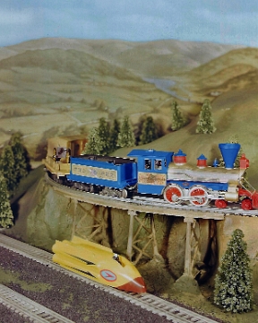 Washington Set on Low Trestle This photo featuring Pikemaster track was probably taken on the same diorama or layout as the previous photo. While it is very similar in composition to the previous photo, the trestle is much lower and of a different design using American Flyer trestle piers as supports. I have not been able to identify any Gilbert advertising which uses this photo.