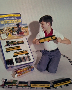 Frontiersman on the Floor This is an excellent view of the 1959 or 1960 version of the Franklin set. The boy is holding the baggage car that was offered as a cereal premium with the purchase of the set. I have not been able to identify any Gilbert advertising which uses this photo.